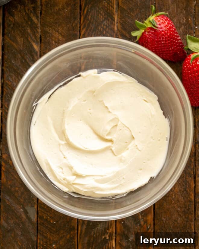 Stuffed Strawberries filling mixed in a bowl, showcasing a smooth and creamy texture.
