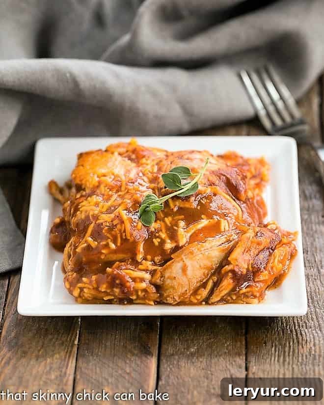 Turkey Enchilada Casserole on a square white plate