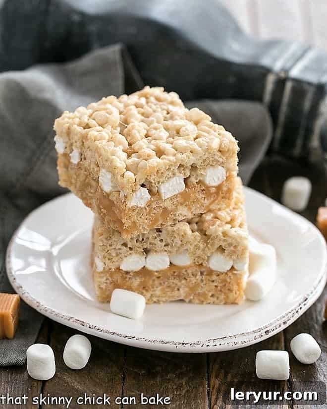 Caramel Stuffed Rice Krispie Treats on a round dessert plate.
