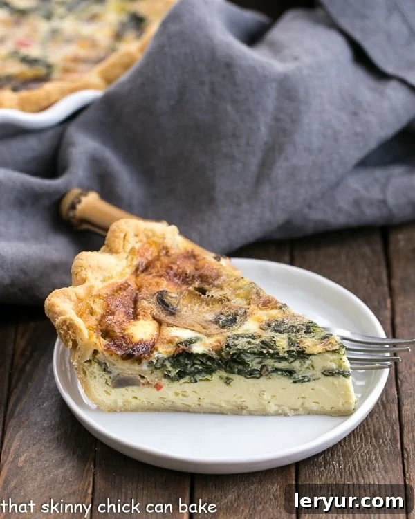 Spinach Mushroom Quiche - A rich, tender quiche full of cheese and vegetables A perfectly baked slice of golden Spinach Mushroom Quiche on a white plate, revealing layers of vibrant spinach, earthy mushrooms, and melted cheese, ready to be enjoyed.