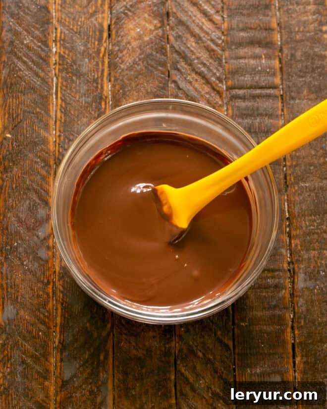 Forget Reeses: These Are The Best Peanut Butter Bars 7 Melted chocolate and vegetable oil mixed until smooth and glossy.