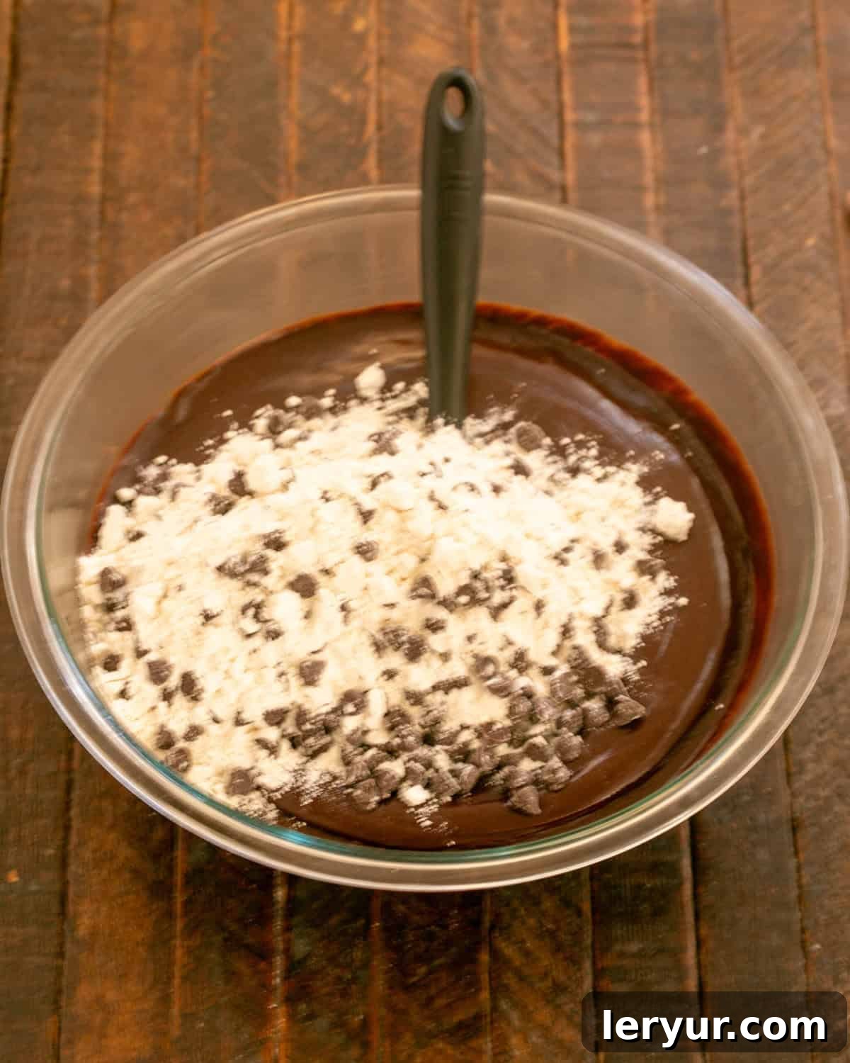Step 7: Combining the chocolate chip-coated flour mixture with the chocolate-egg mixture.
