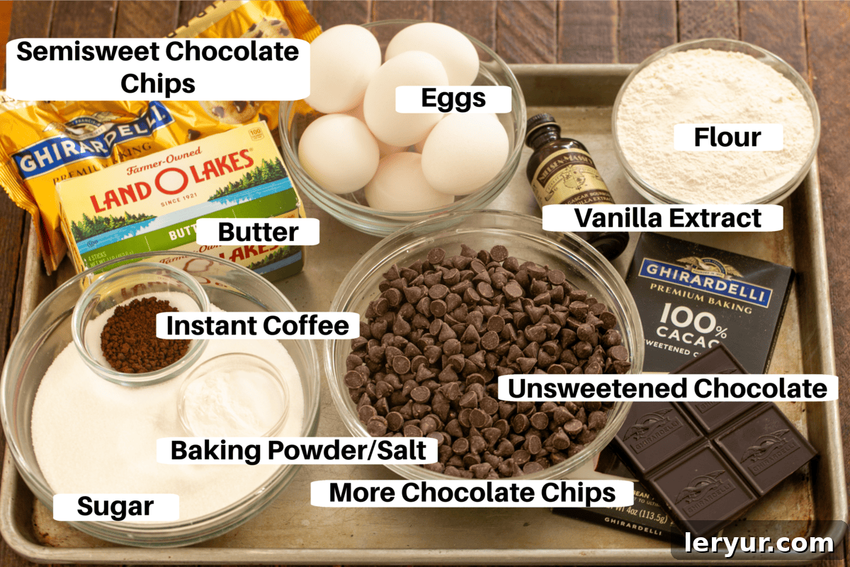 Sheet Pan Brownies Ingredients meticulously arranged on a metal sheet pan with labels, ready for baking.
