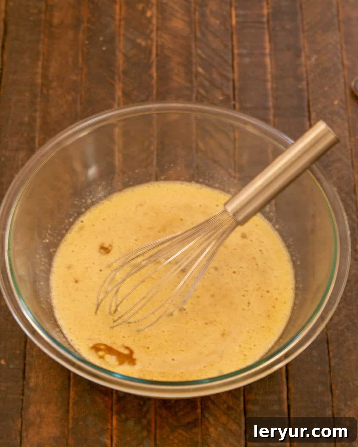 Step 3: Whisking eggs, instant coffee, vanilla, and sugar in a separate bowl.