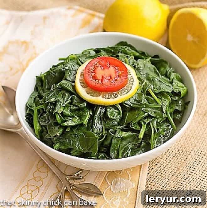 Shake up your side dishes with this super easy, tasty lemon steamed spinach recipe. This baby spinach recipe is a change of pace from your usual vegetables. Lemon Steamed Spinach in a white bowl