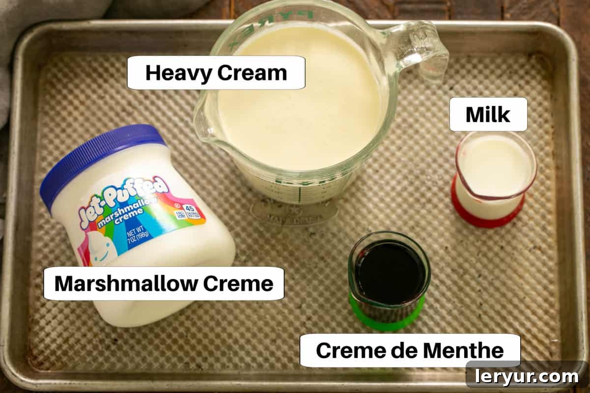 Emerald Oasis Oreo Dream 3 Ingredients for Grasshopper Pie Filling artfully arranged on a metal sheet pan with descriptive labels.