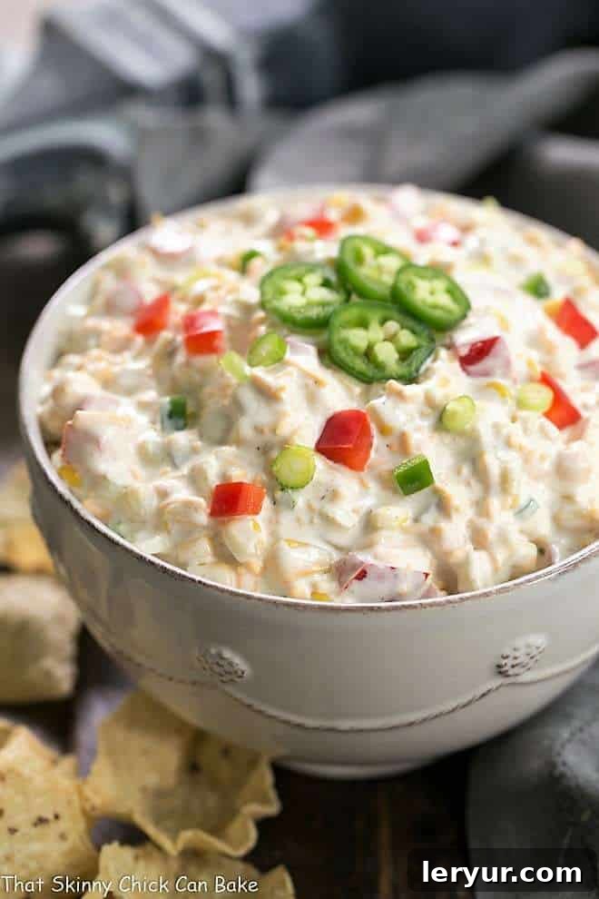 Sour Cream Corn Dip Recipe in a white serving bowl.
