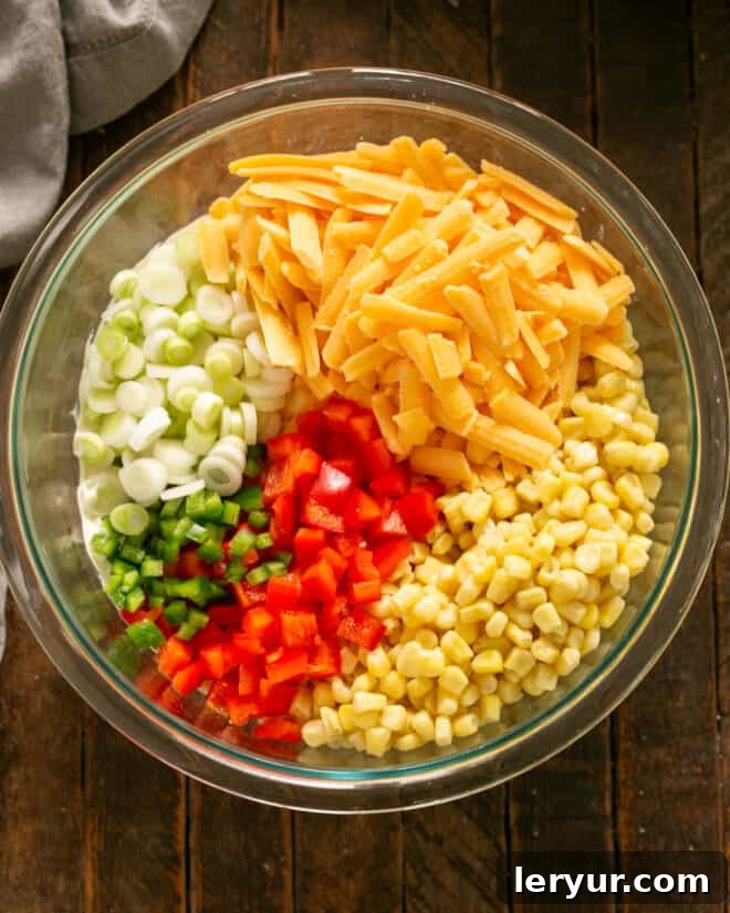 Adding all other ingredients to a large mixing bowl.