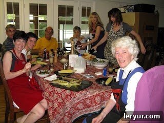 With my sisters and parents in my childhood home at our dining room table.