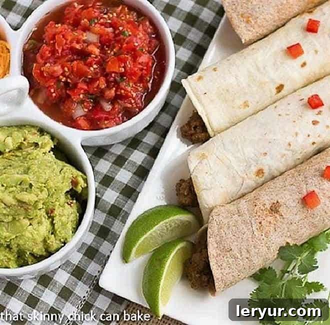 Homemade Soft Shell Beef Tacos - An incredibly easy dinner recipe that you can customize with your favorite spices and toppings for perfect flavor! An overhead shot showcasing a platter of delectable Soft Shell Tacos with Homemade Beef filling, surrounded by vibrant toppings, ready to be enjoyed.
