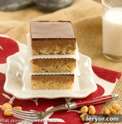 Chocolate Peanut Butter Krispie Bars Stacked on a square white plate