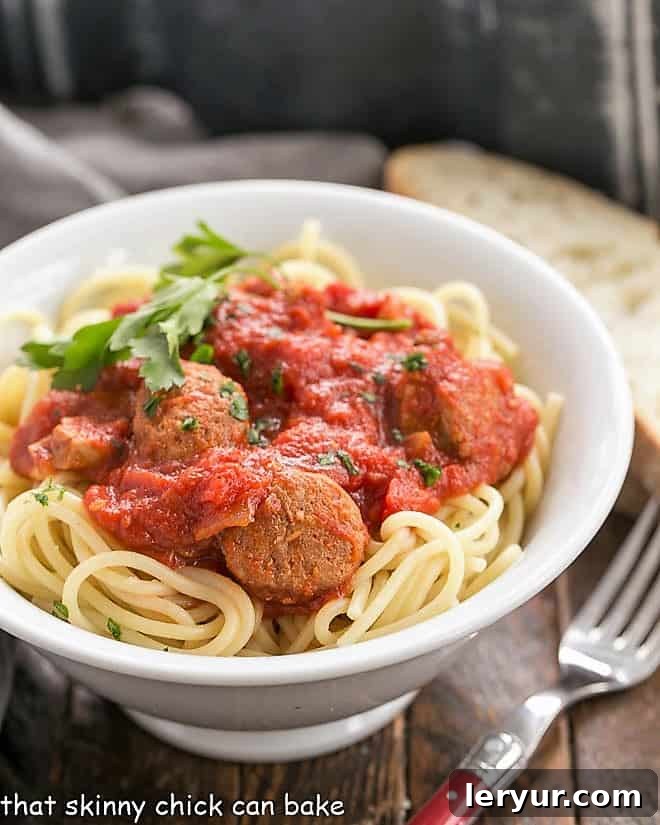 Homemade Pasta Sauce Recipe with rich red sauce in a pristine white ceramic bowl, ready to be served.