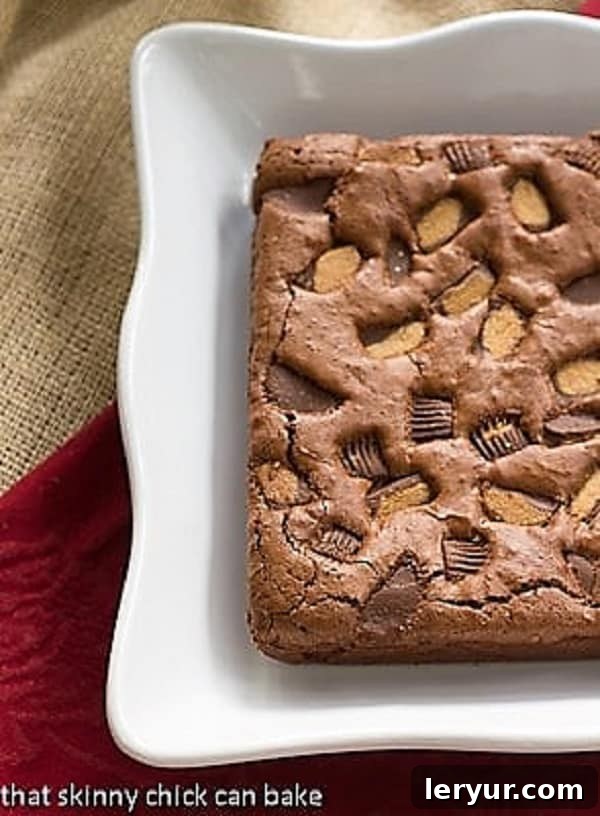 Delicious Reese's Brownies for any gathering Serving tray filled with rich Fudgy Brownies with Reese's Chunks, ready to be enjoyed