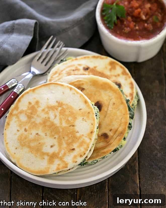 Three golden-brown quesadilla halves on a pristine white plate, garnished with a sprig of fresh parsley and a side of vibrant salsa, showcasing their irresistible crispness and cheesy filling.