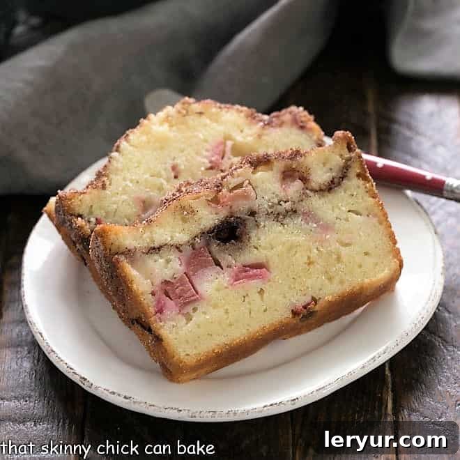 Two slices of one of the best Rhubarb Bread Recipes, featuring a perfect cinnamon swirl.