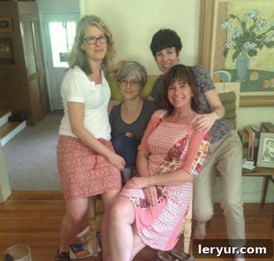 The author and her sisters gathered happily in their childhood home, sharing a warm moment