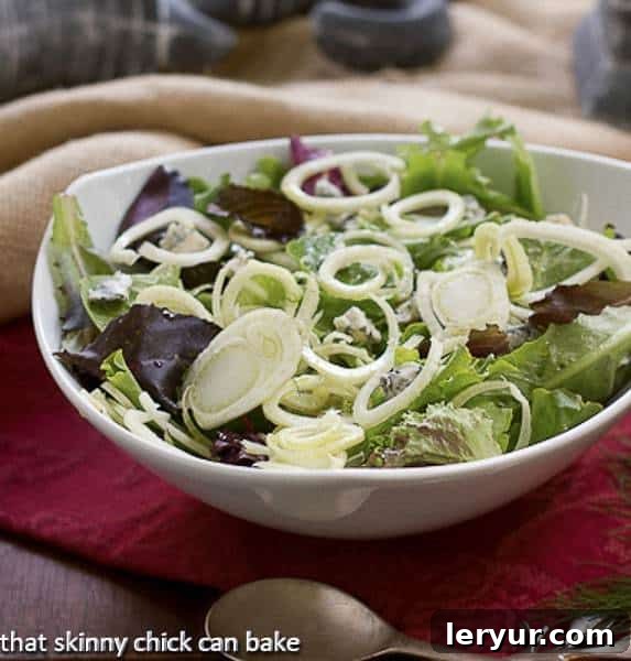 Fennel and Gorgonzola Salad in a white salad bowl, ready to be served and enjoyed