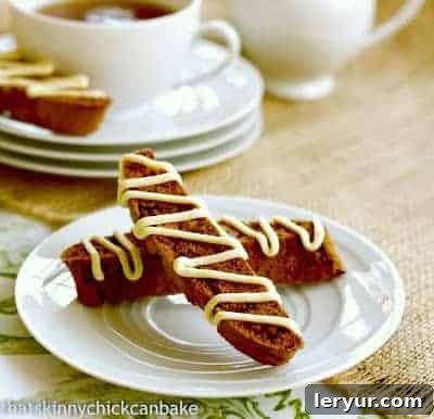 Gingerbread Biscotti on a round white plate, ready to be served or gifted.
