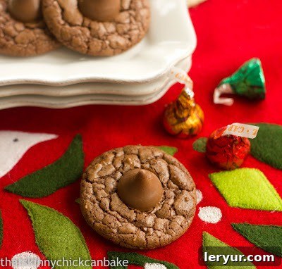 Double Chocolate Thumbprint Cookies beautifully arranged on a festive holiday stocking.
