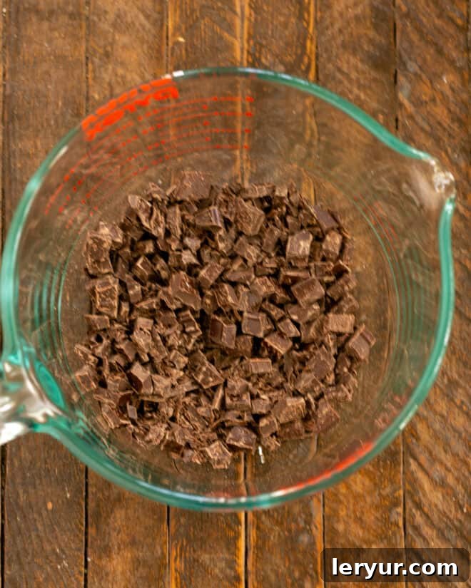 Decadent Italian Chocolate Budino 8 Coarsely chopped semisweet chocolate placed in a heatproof mixing bowl.