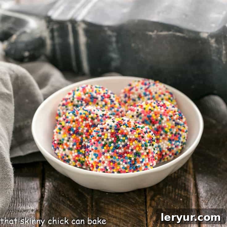Sprinkle cookies in a shallow white ceramic bowl
