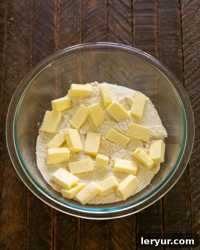 Add butter to dry ingredients.