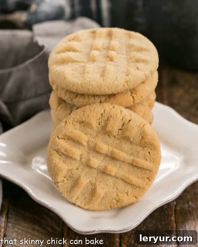 The Best Peanut Butter Cookies on a square white dessert plate.